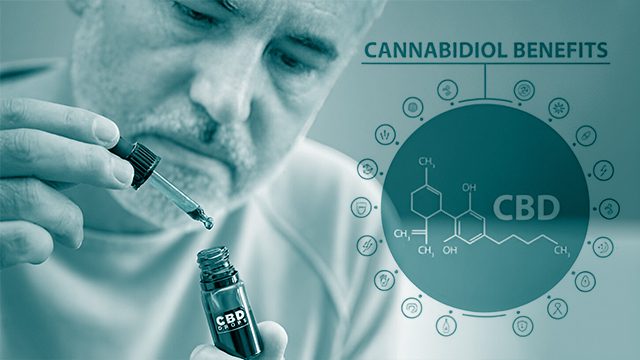 A man holds a dropper and CBD bottles for takin Benefits of CBD. 