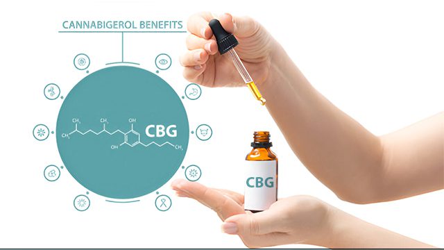 A hand holds a dropper and CBG on other hand.